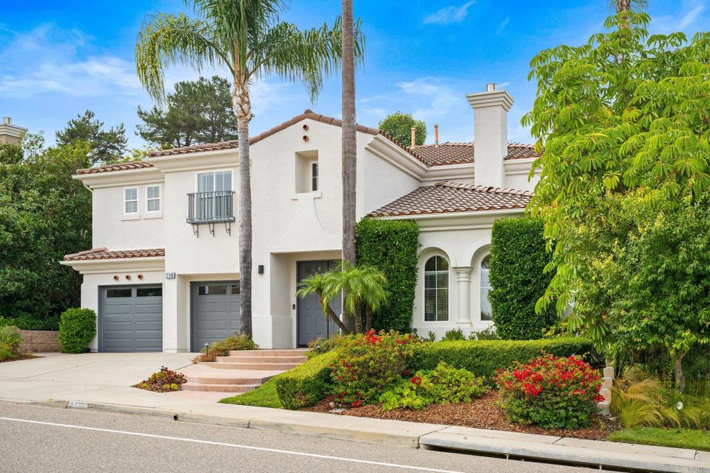 front view of a house with a garden