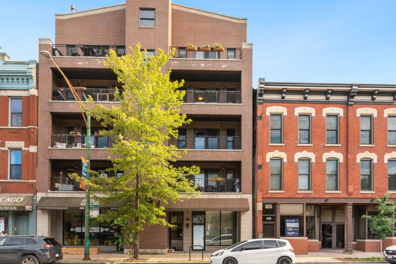 a front view of multi story residential apartment building