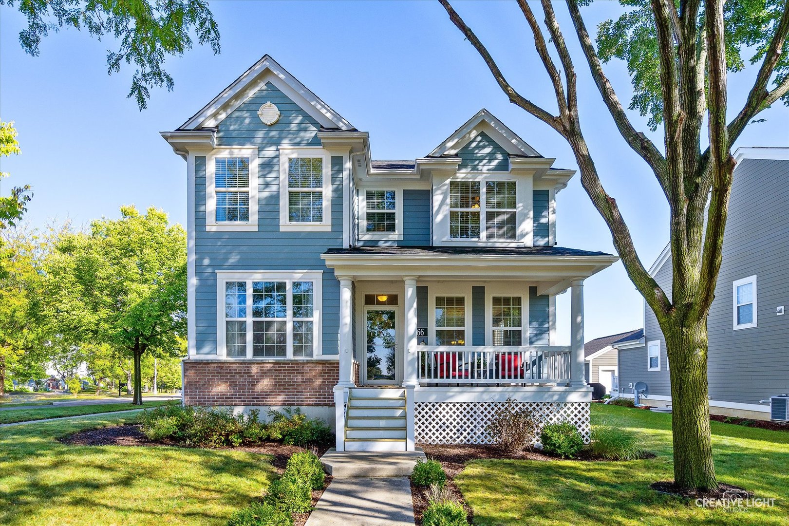 front view of a house with a yard