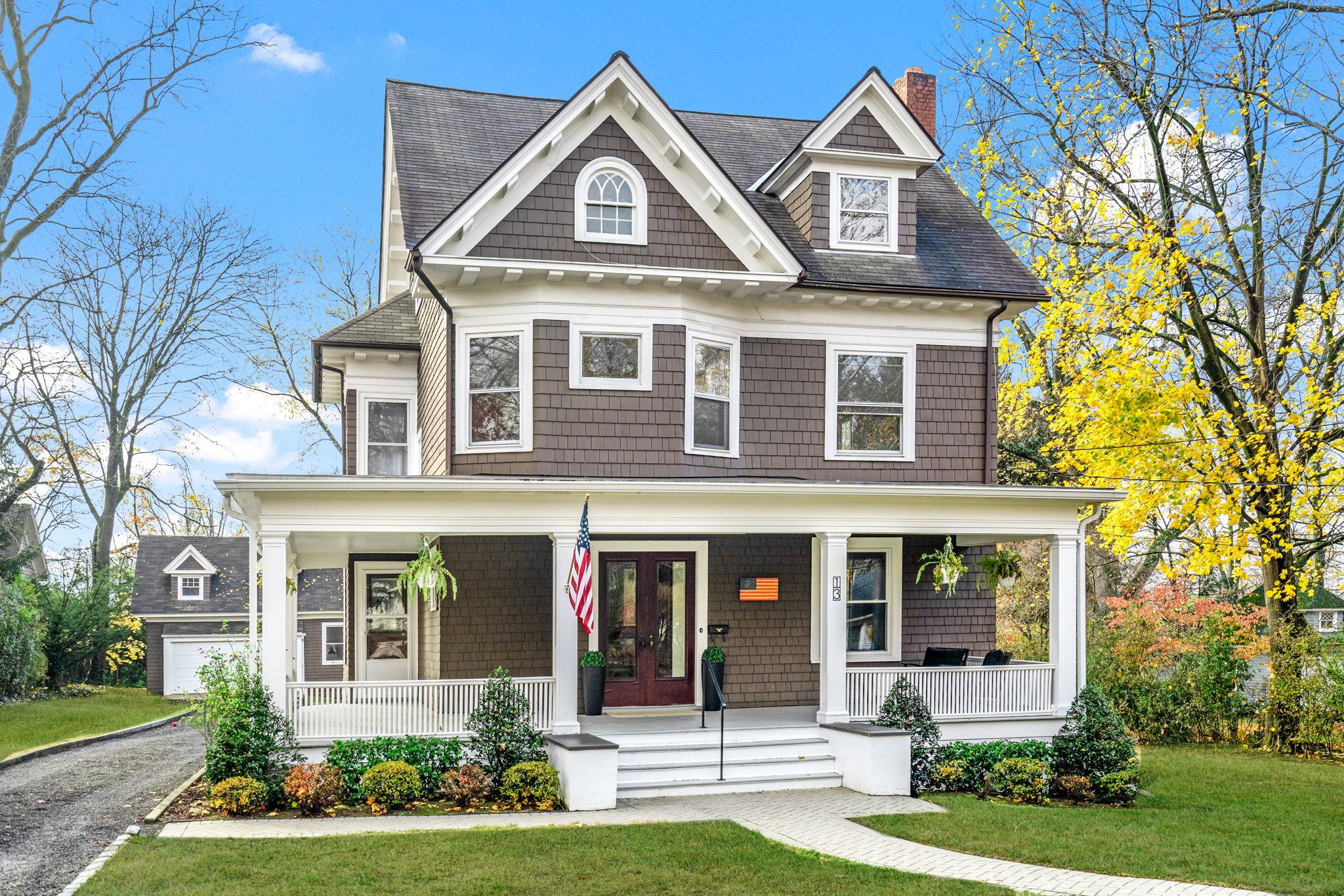 front view of a house with a yard