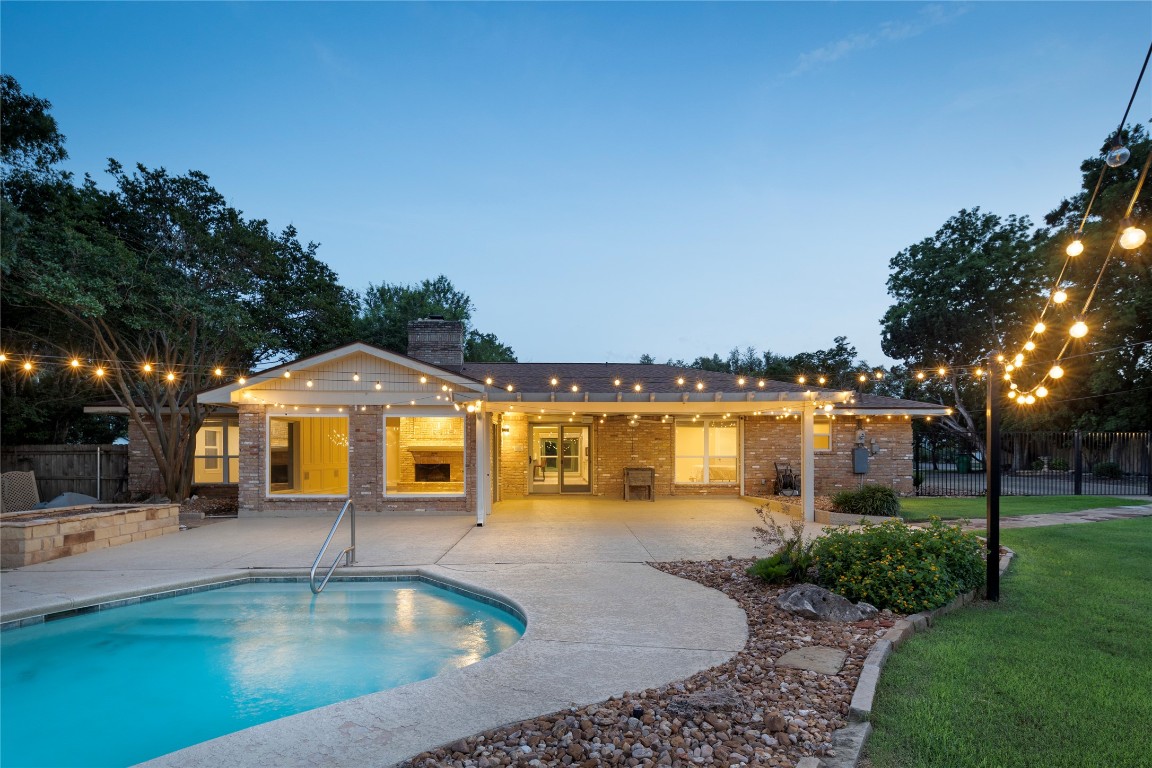 a view of a swimming pool and outdoor space