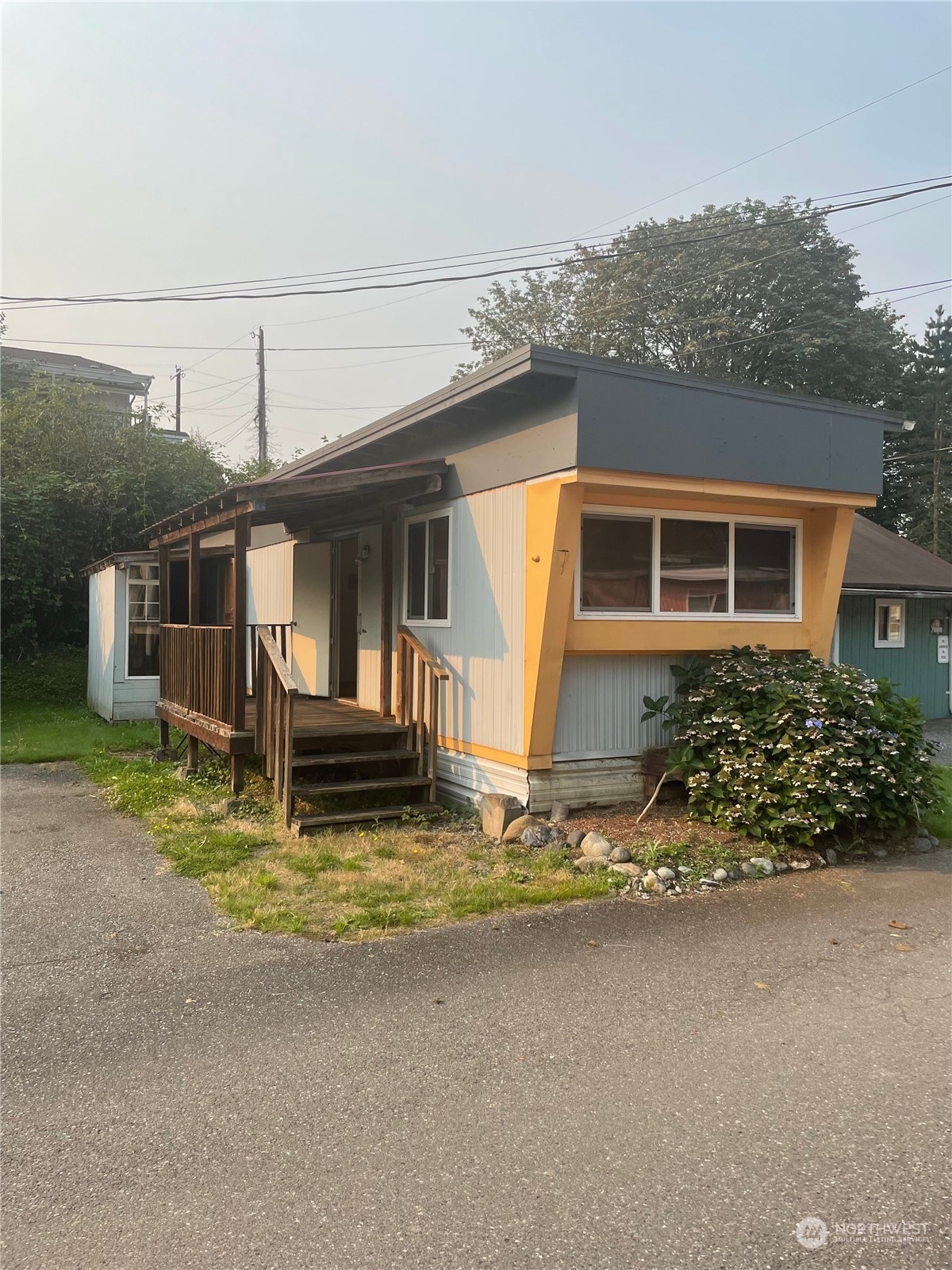 front view of a house with a fence