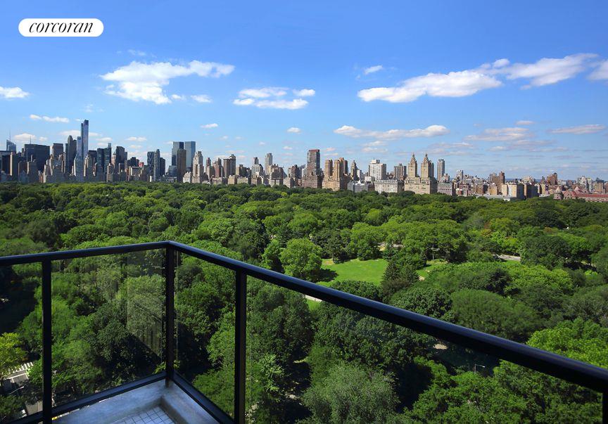 a view of a city skyline from a balcony