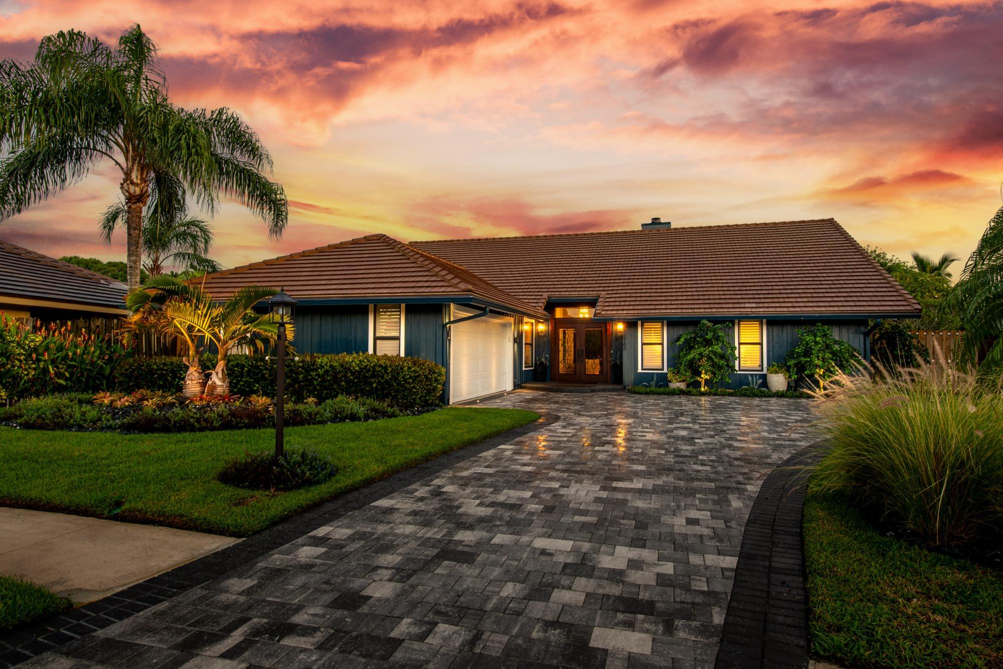 front view of a house with a yard