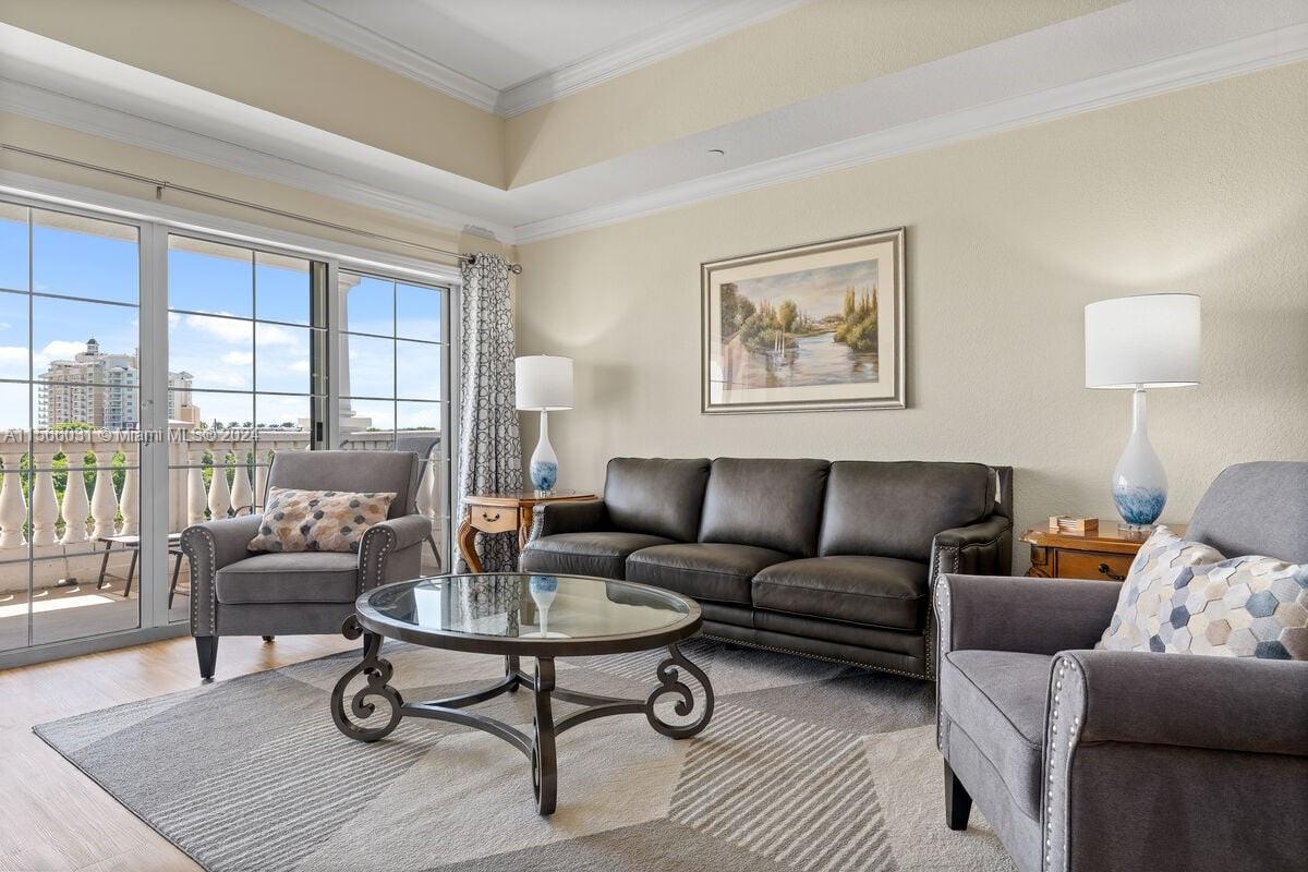 a living room with furniture and a lamp