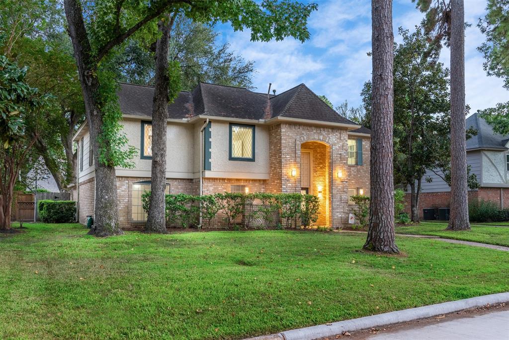 front view of house with a yard