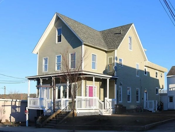 a front view of a house with a porch