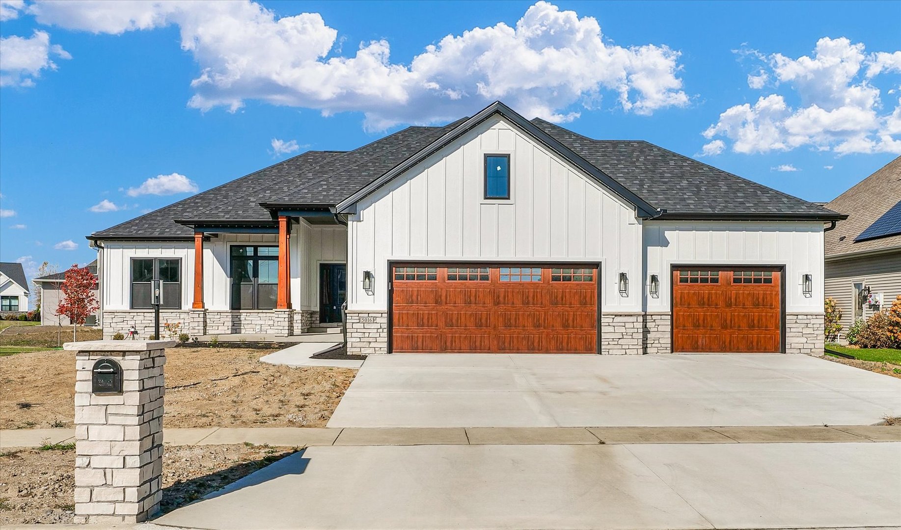 front view of a house with a patio