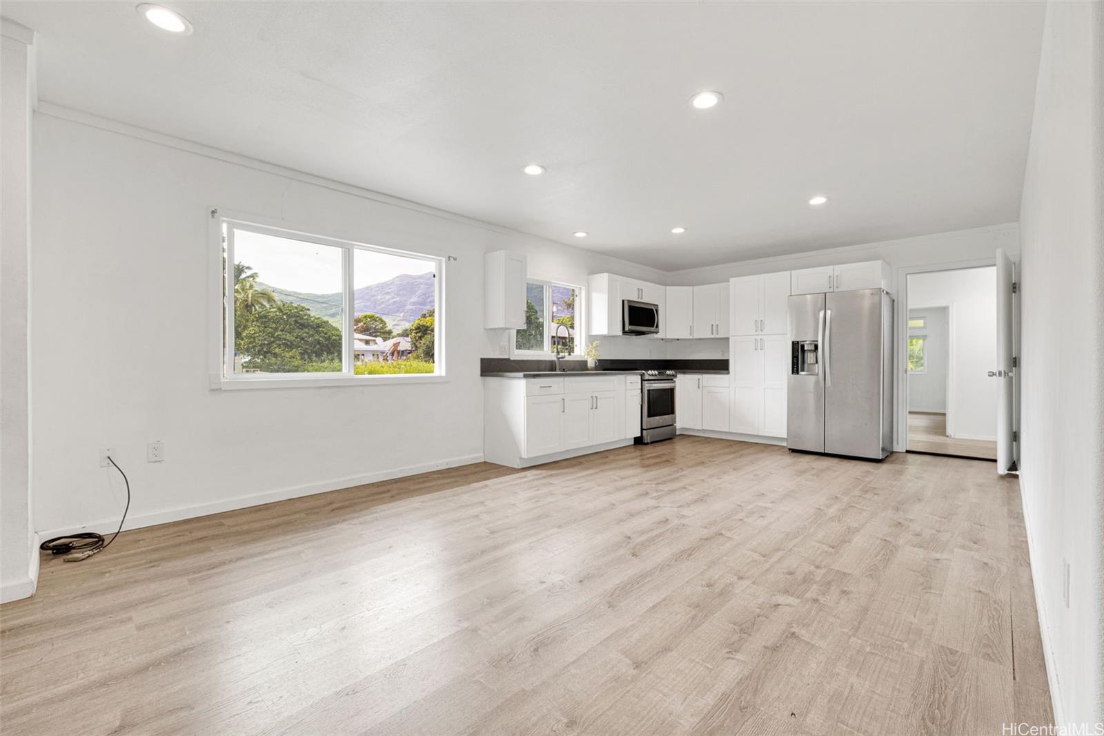 Living room with kitchenarea.