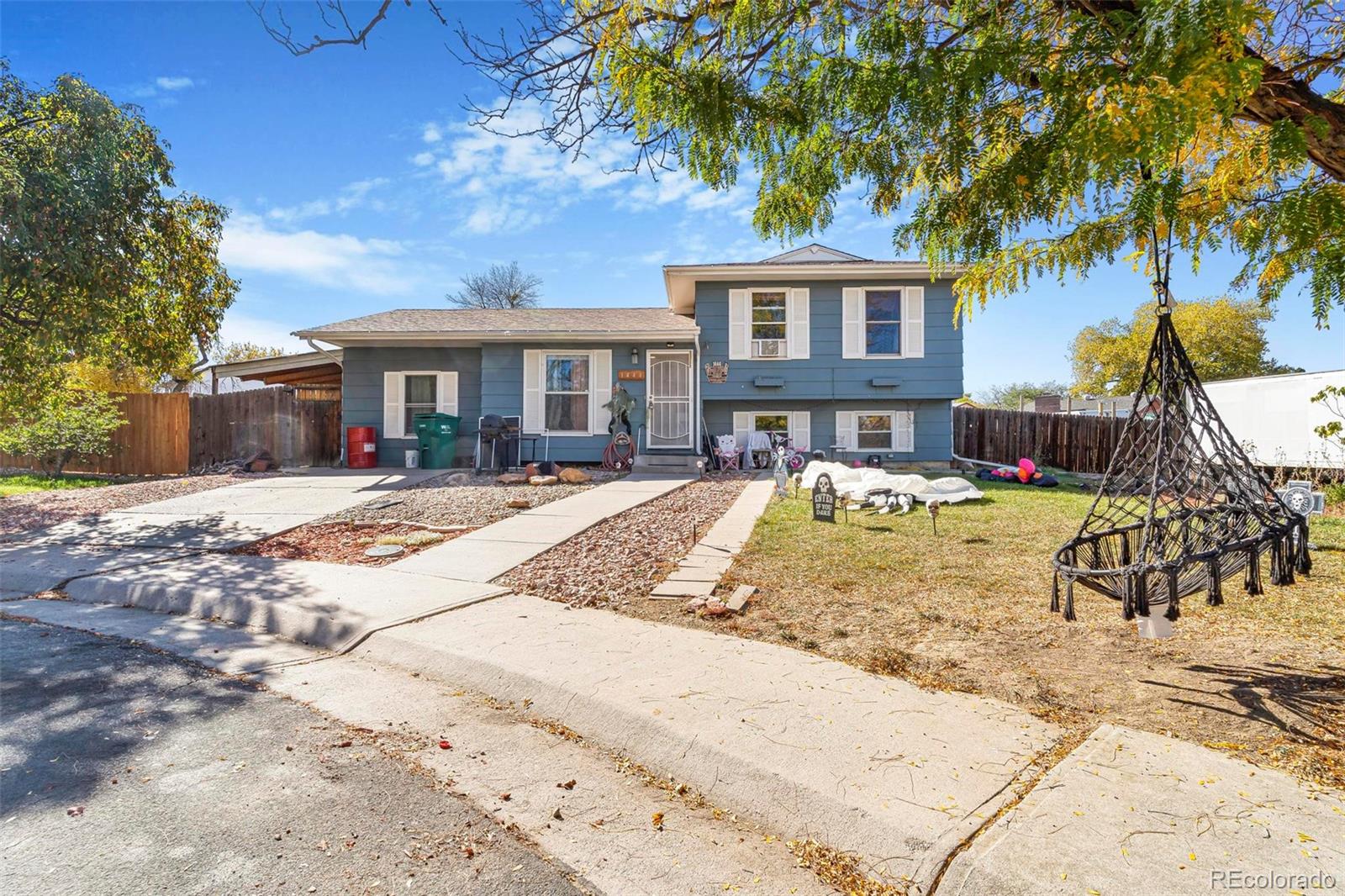 a front view of a house with a patio