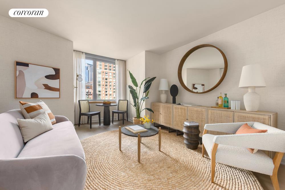 a living room with furniture a mirror and a potted plant