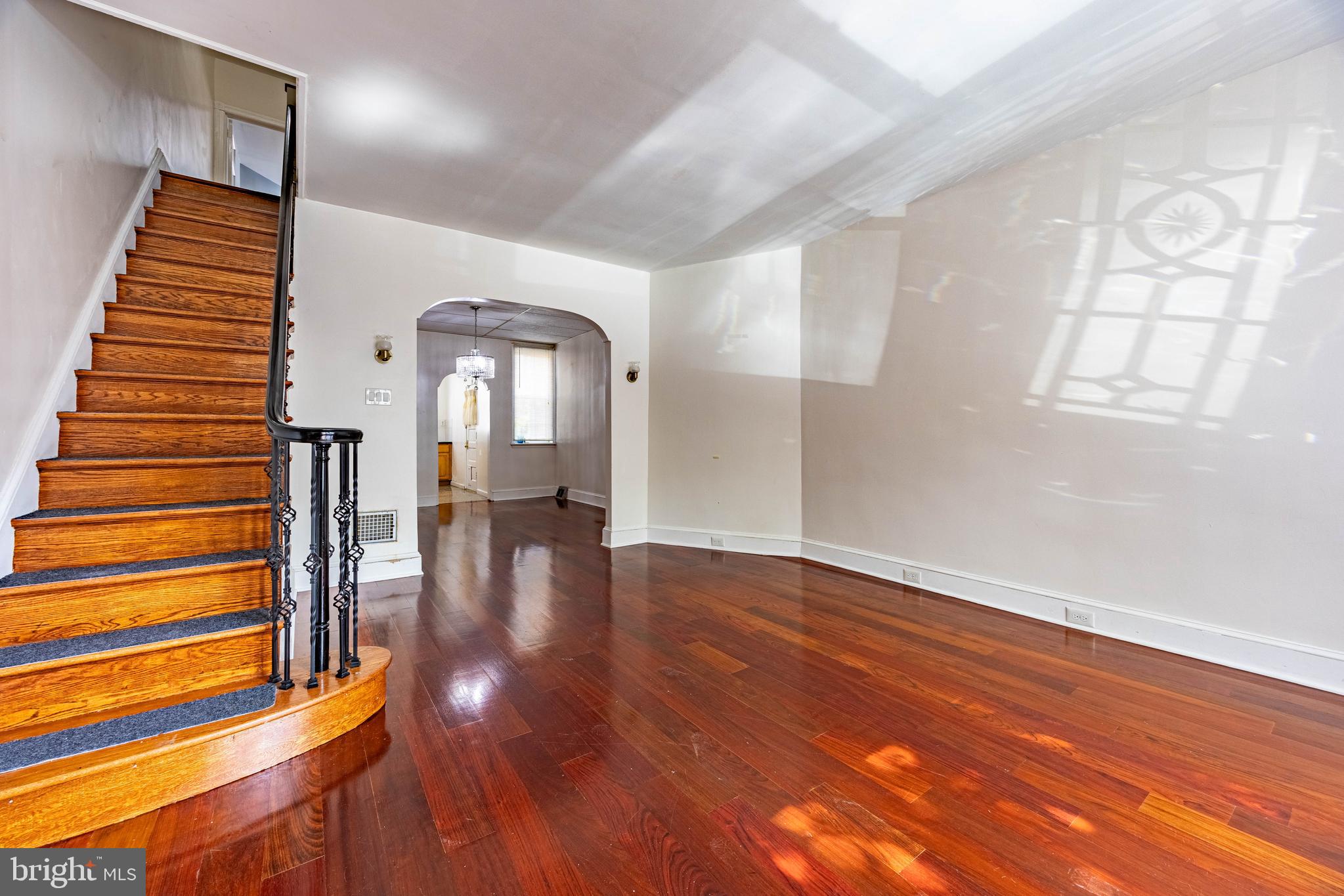 a view of entryway with wooden floor