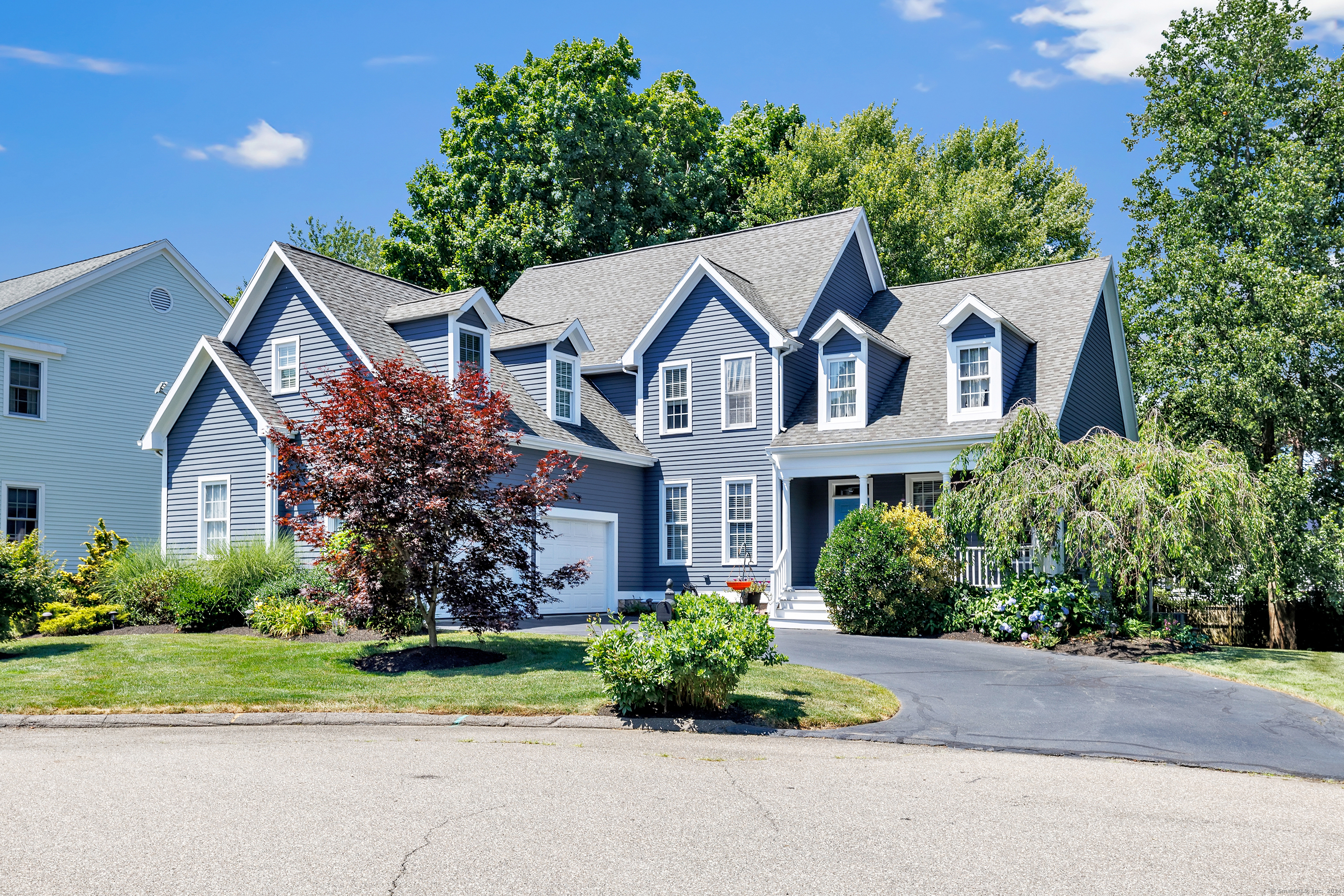 front view of a house with a small yard