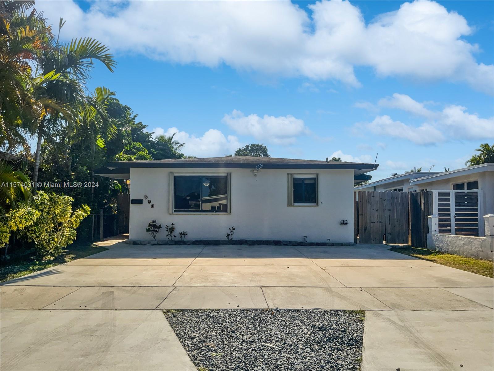 a front view of a house with a garage