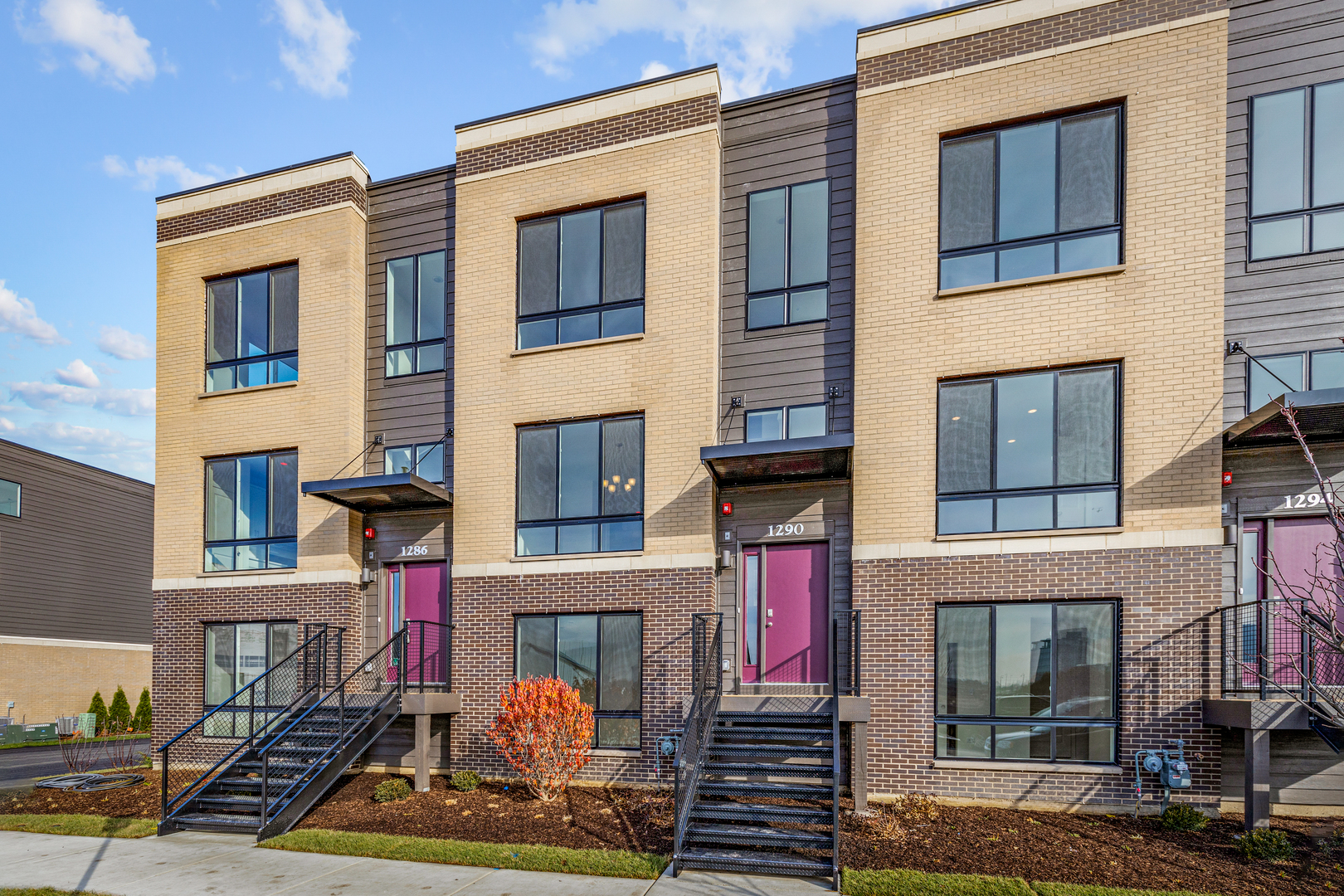 a front view of a multi story residential apartment building