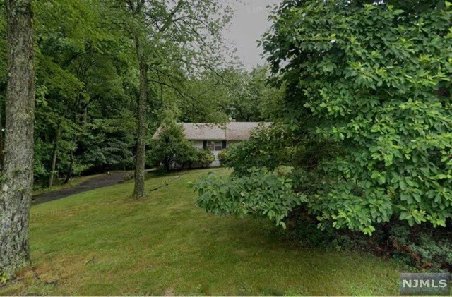 a view of an outdoor space and a yard