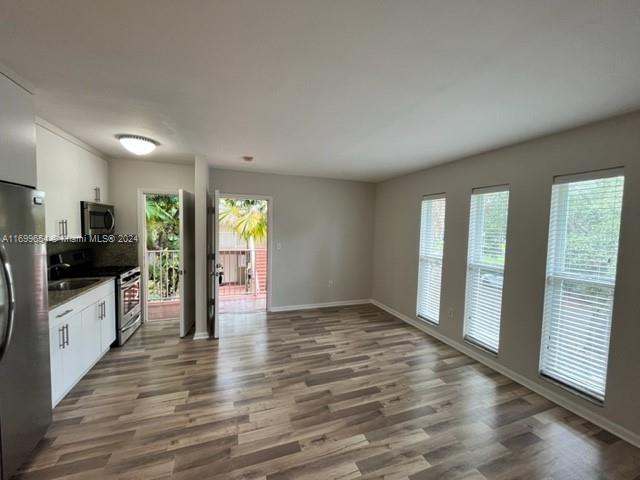 a view of an empty room and window