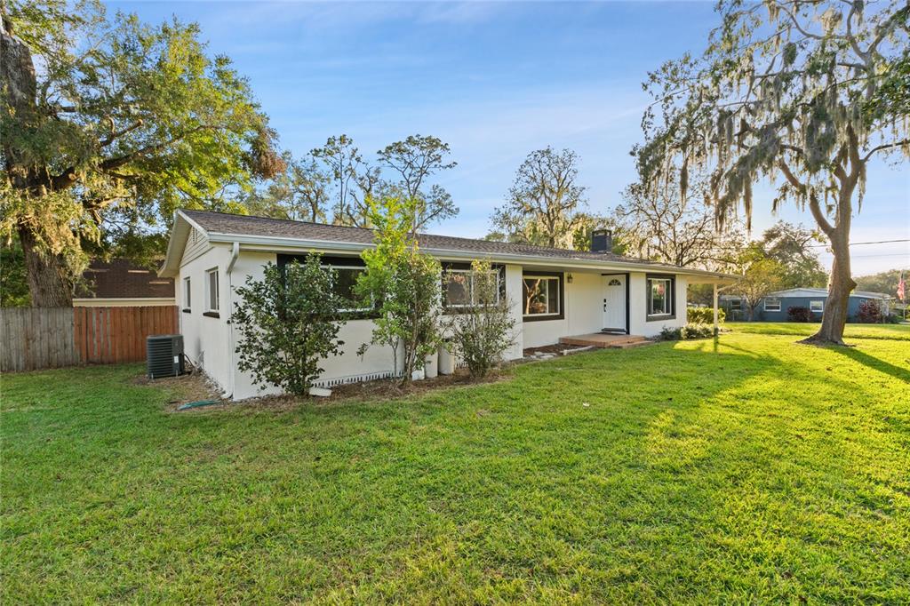 front view of a house with a yard