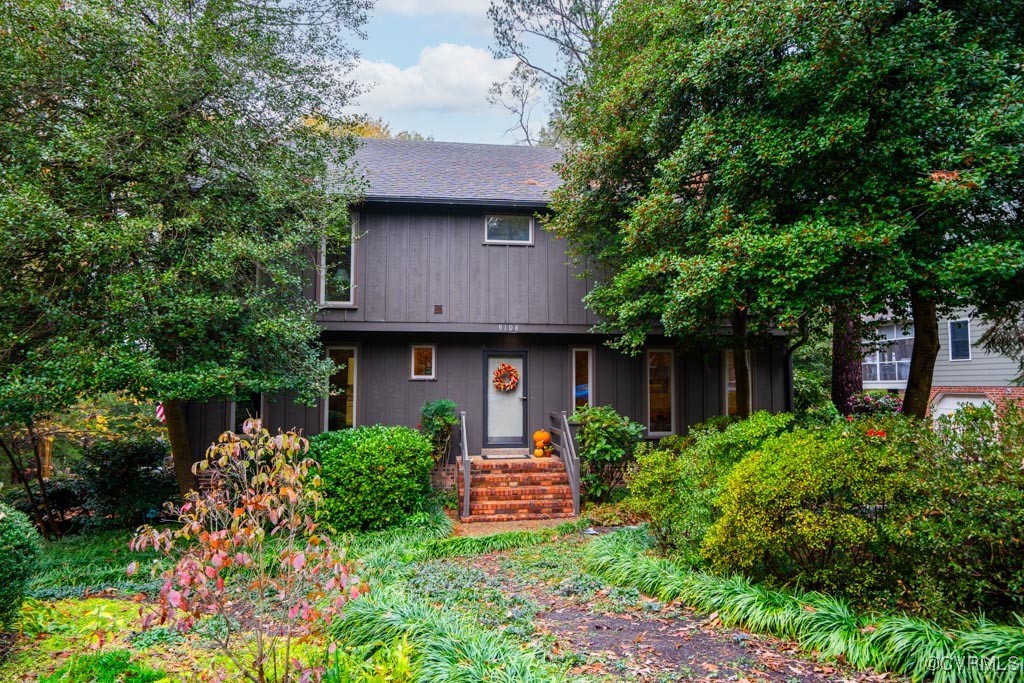 a house view with a garden space