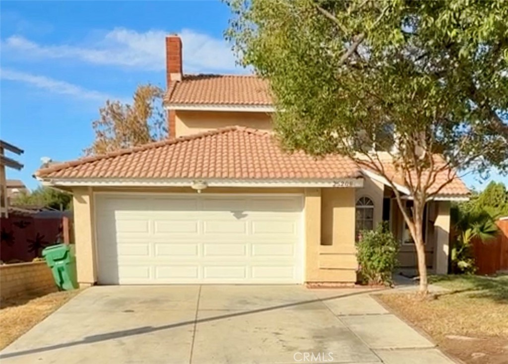 a view of a house with a garage