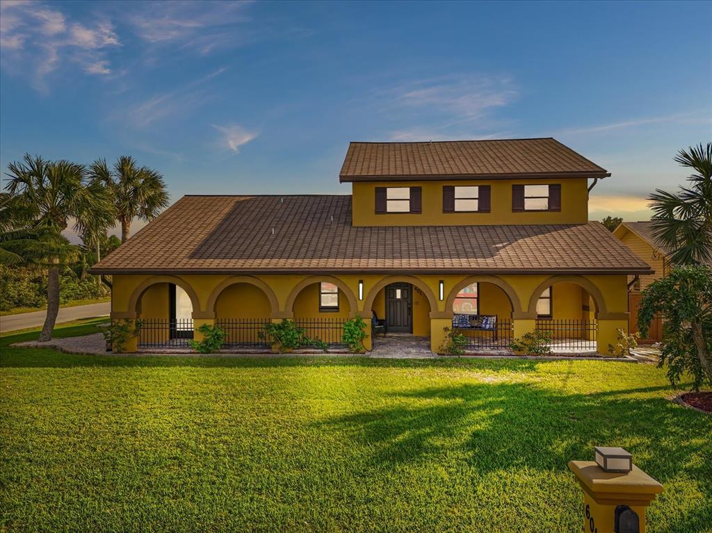 a front view of house with garden