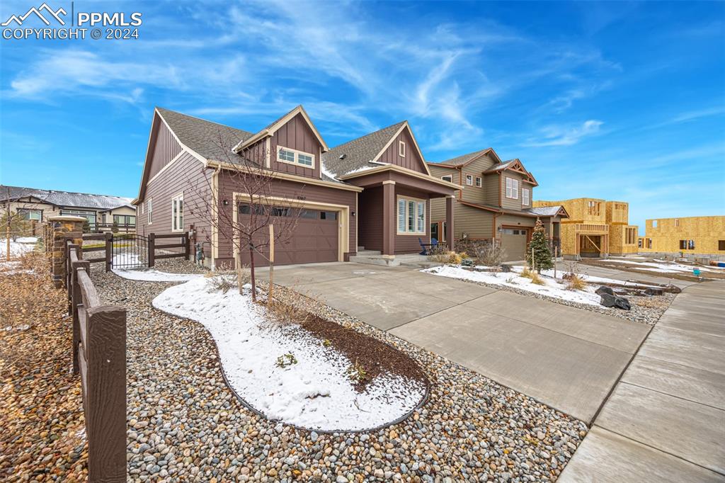 View of front of home featuring a garage