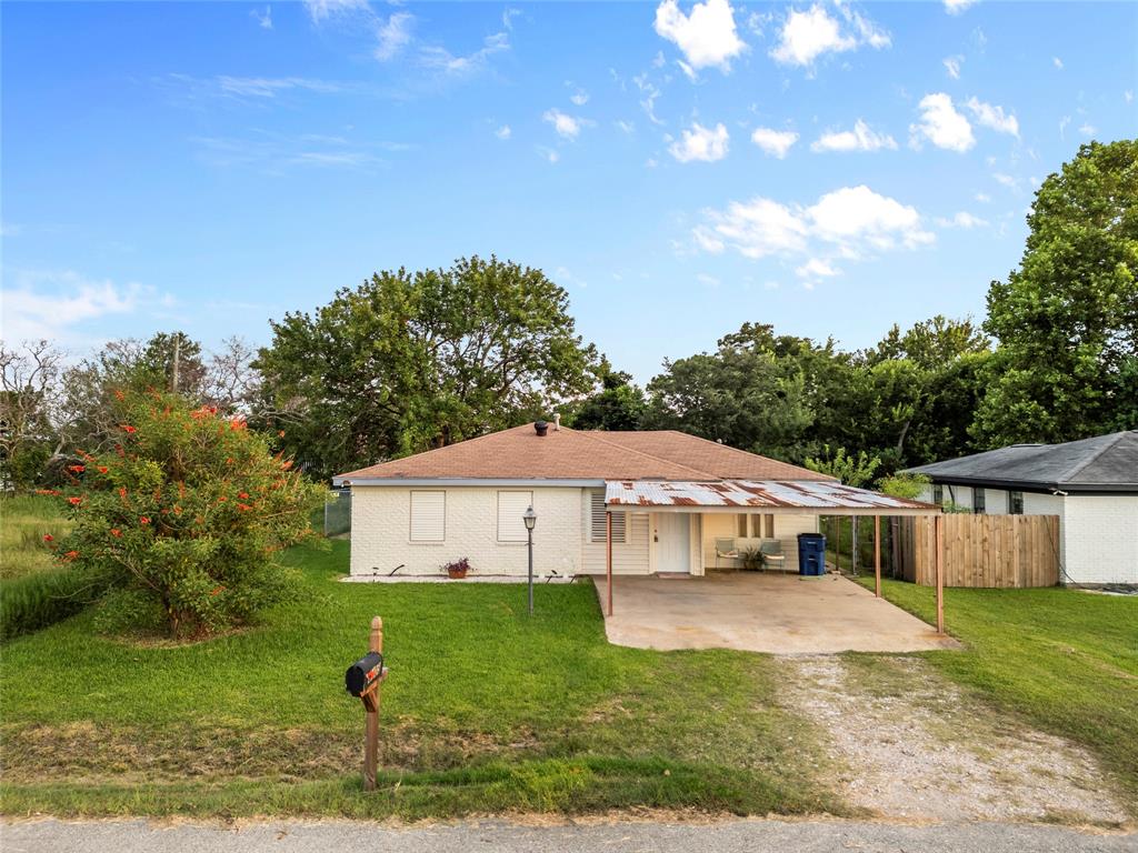 a house view with a garden space