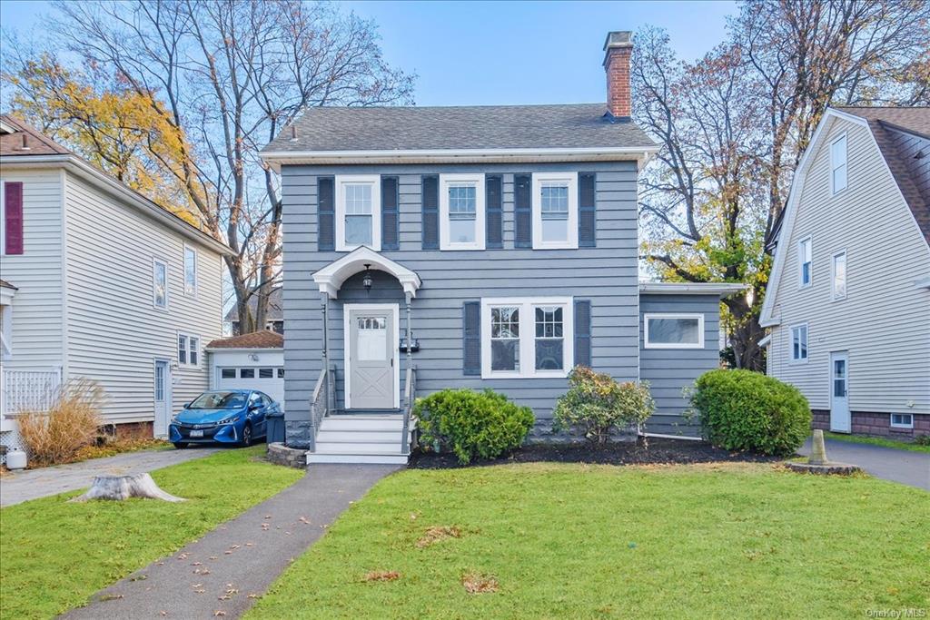 View of front of home with a front lawn