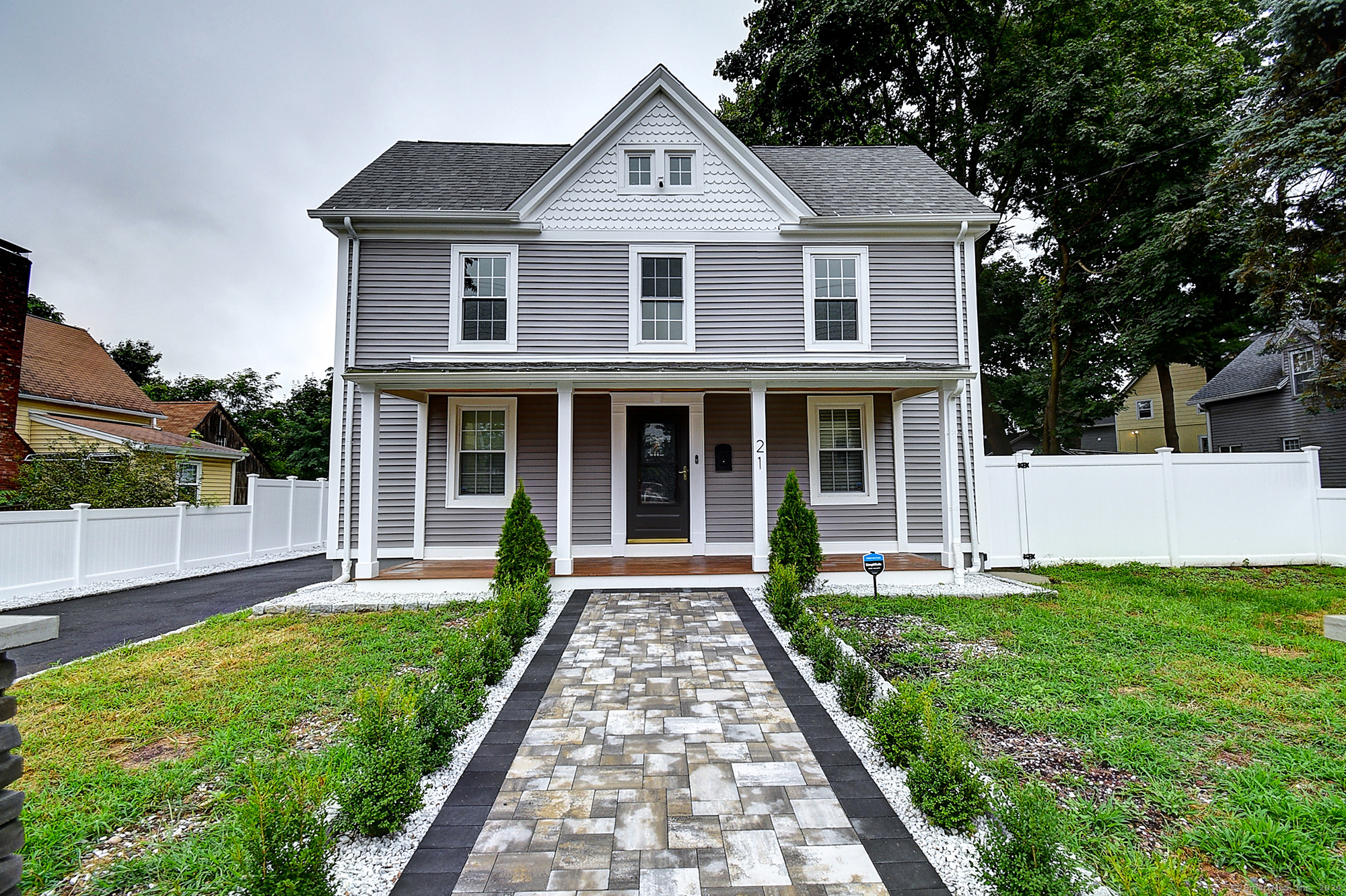 front view of a house with a yard