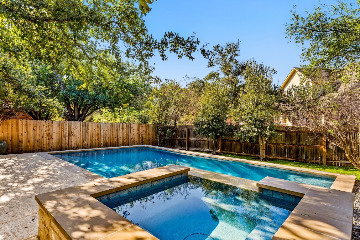 2116 Westfalian in Steiner Ranch is an updated home with 4 bedrooms, 3.5 baths, an office, game room, and wonderful back yard with a pool & spa.