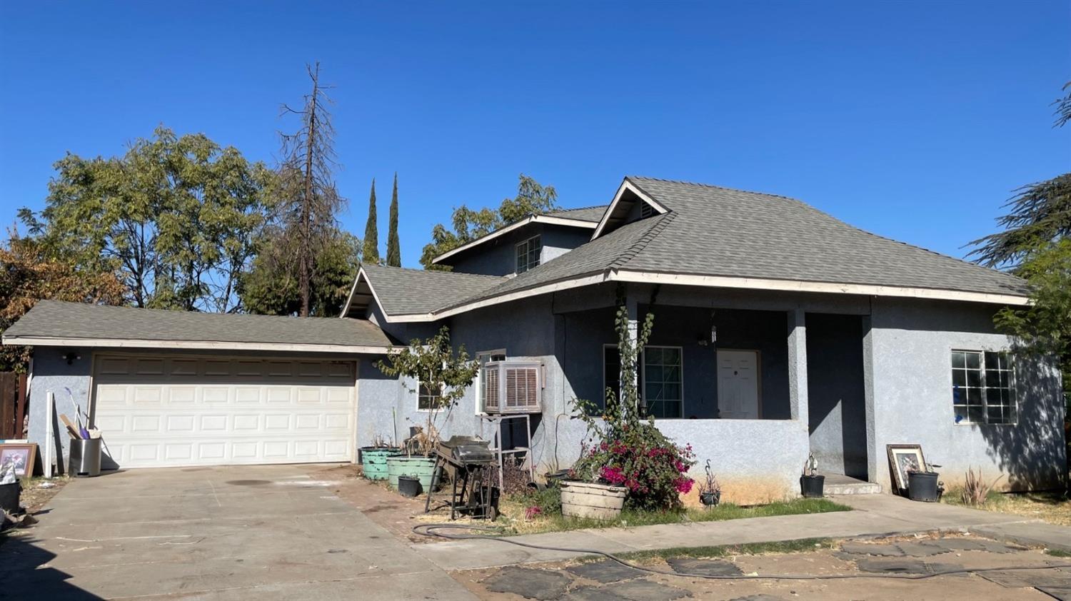 a front view of a house with patio