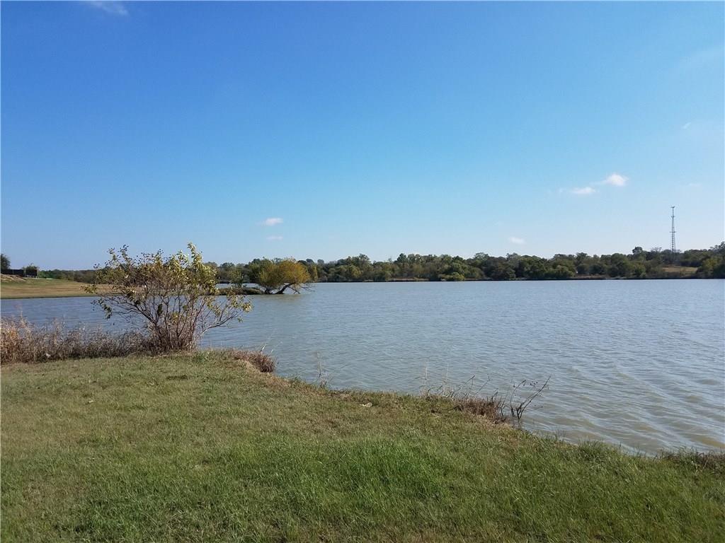 a view of a lake from a yard