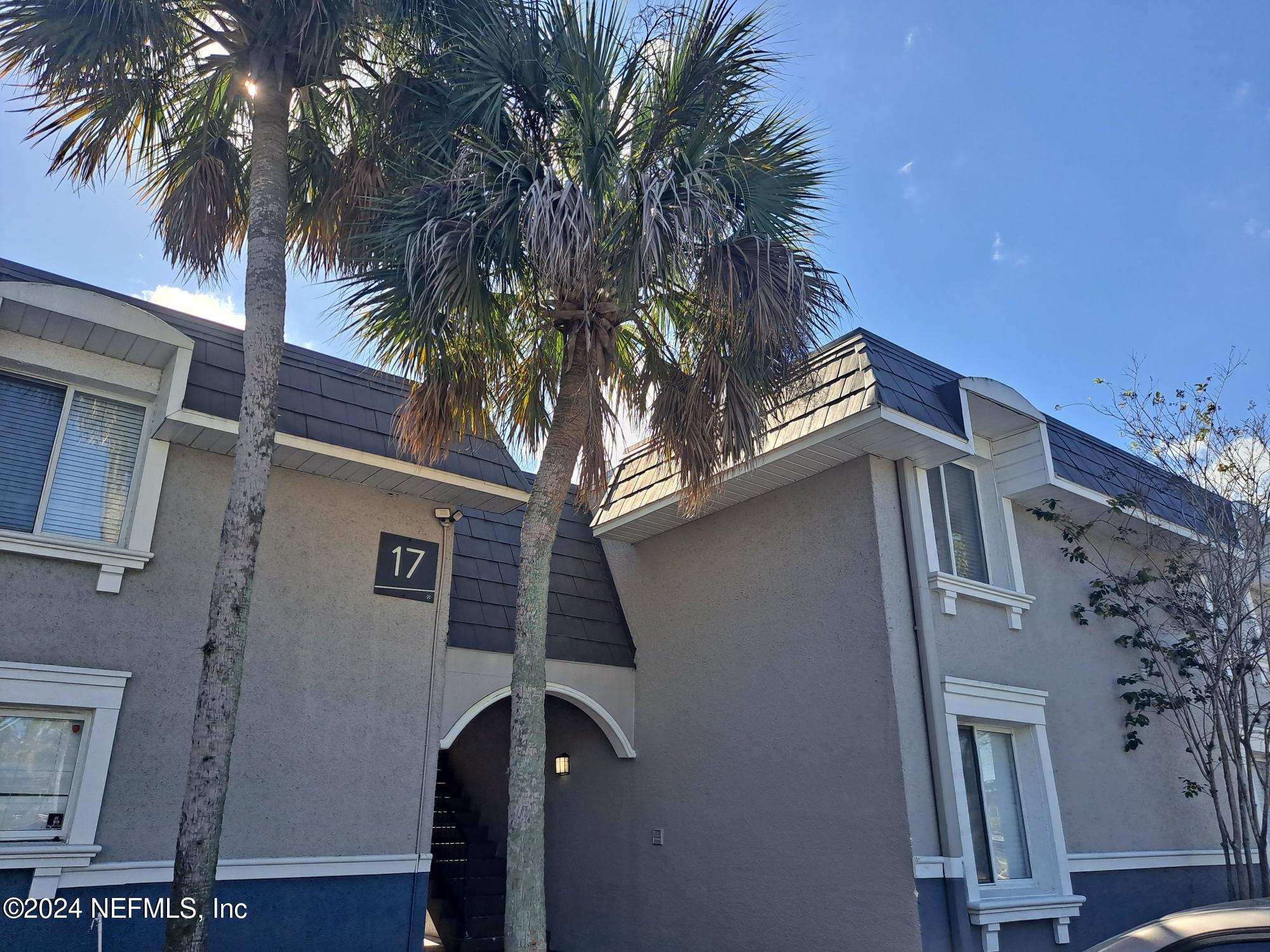 a front view of a house with balcony