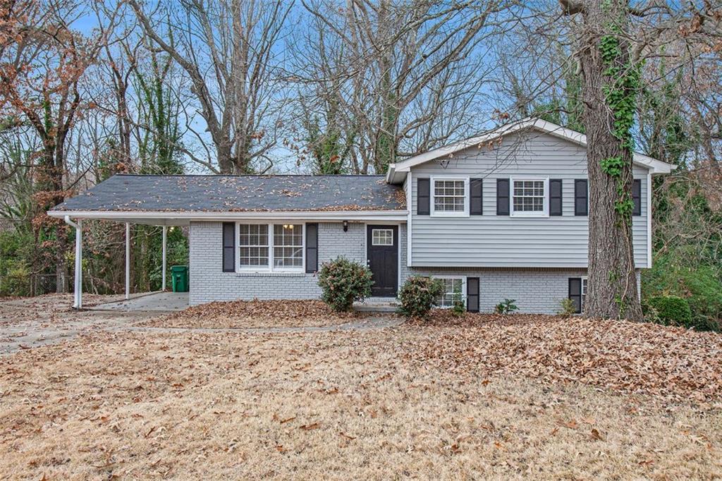 front view of a house with a yard