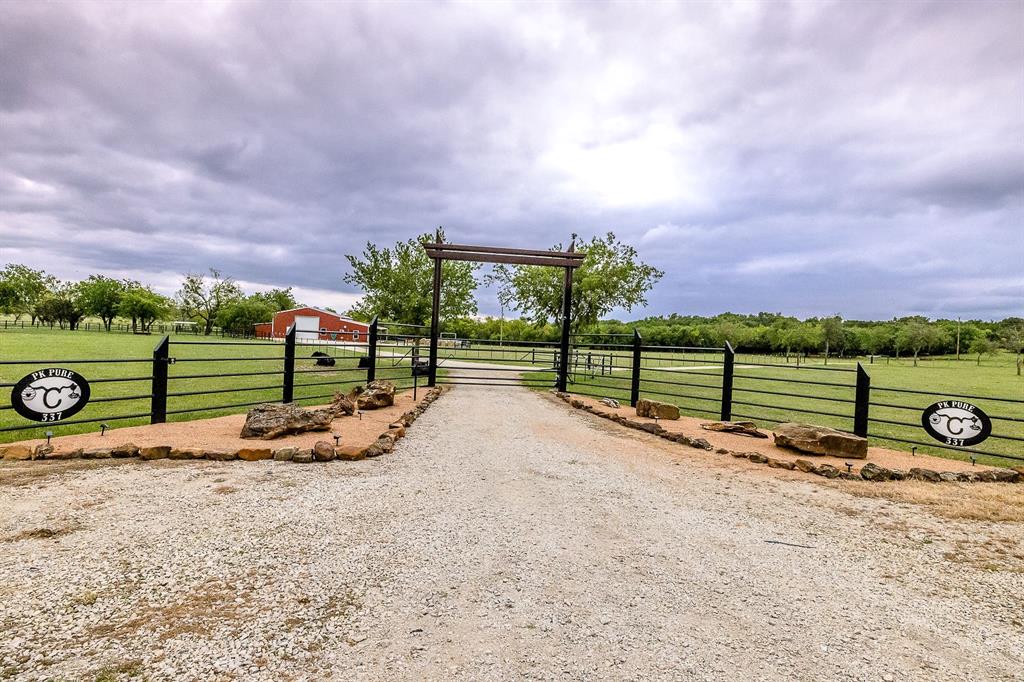 a view of a road with a yard