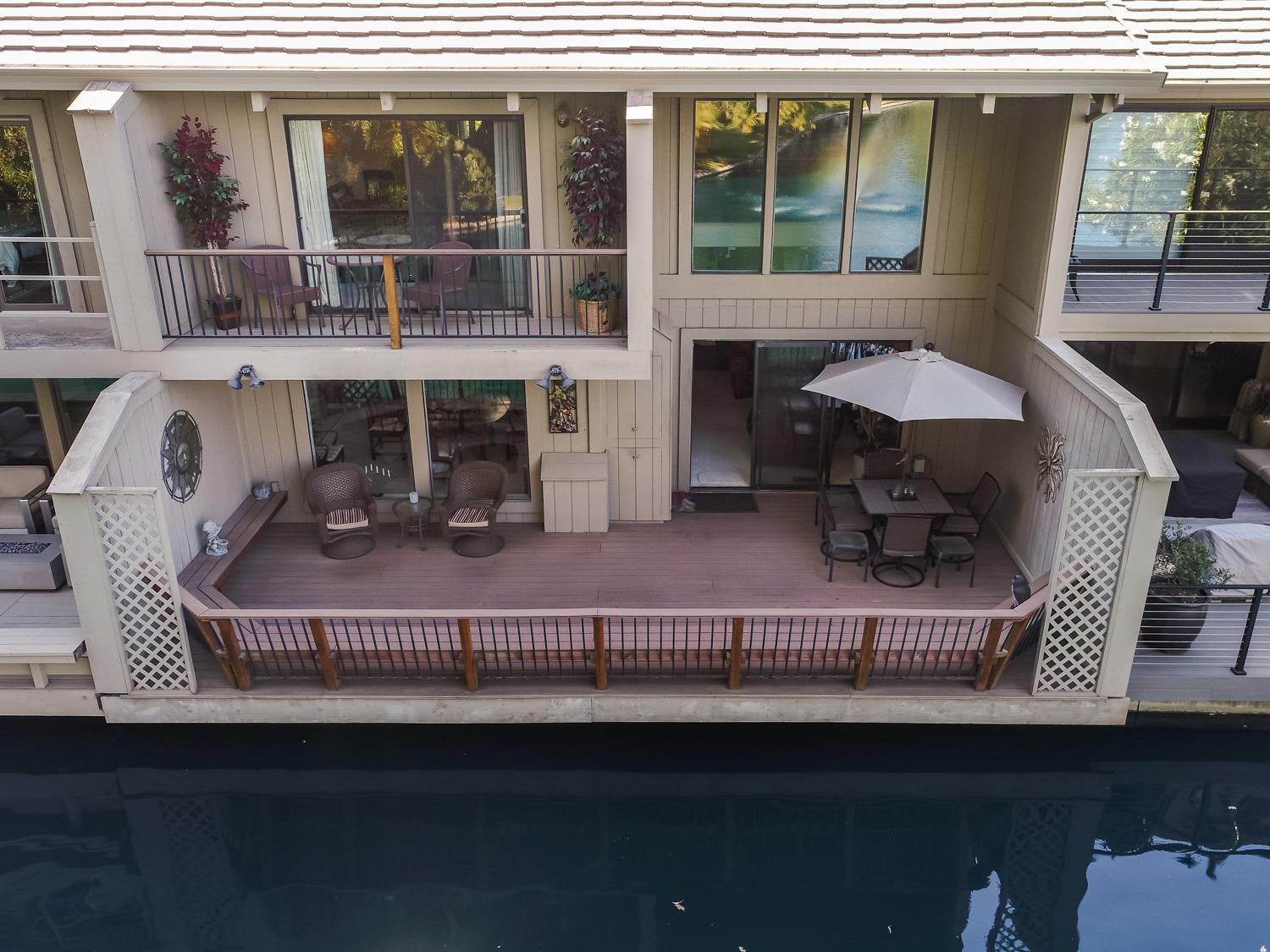 a view of balcony and patio with furniture