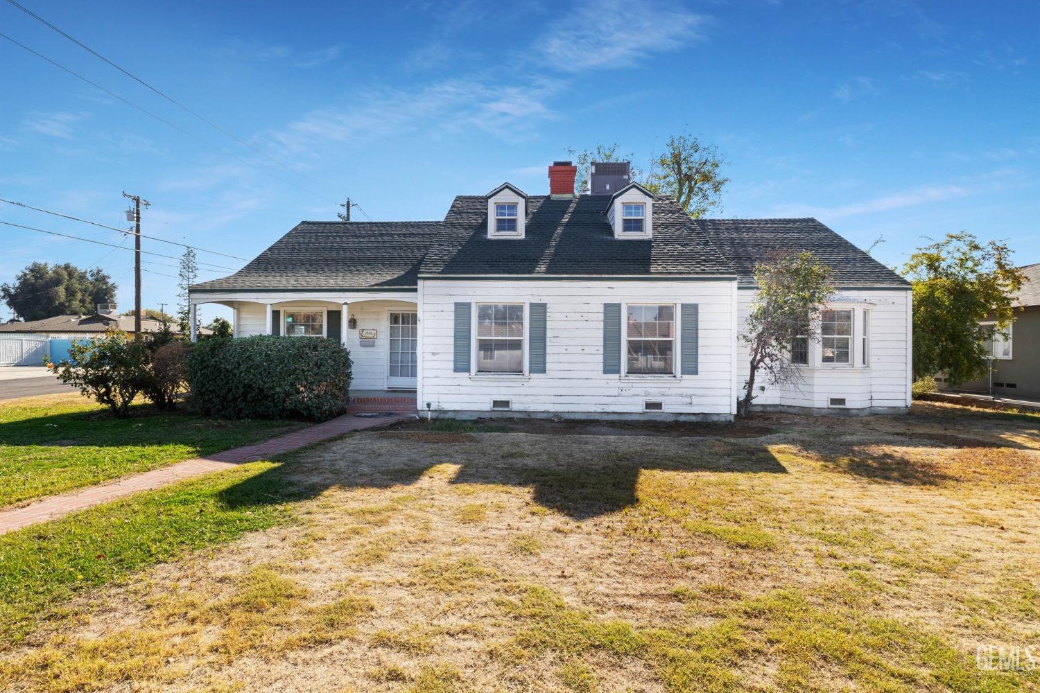 a front view of a house with swimming pool