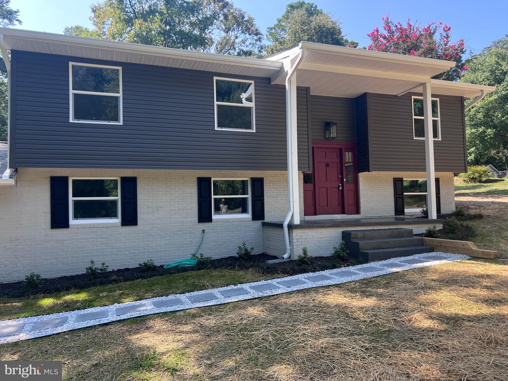 a front view of house with yard