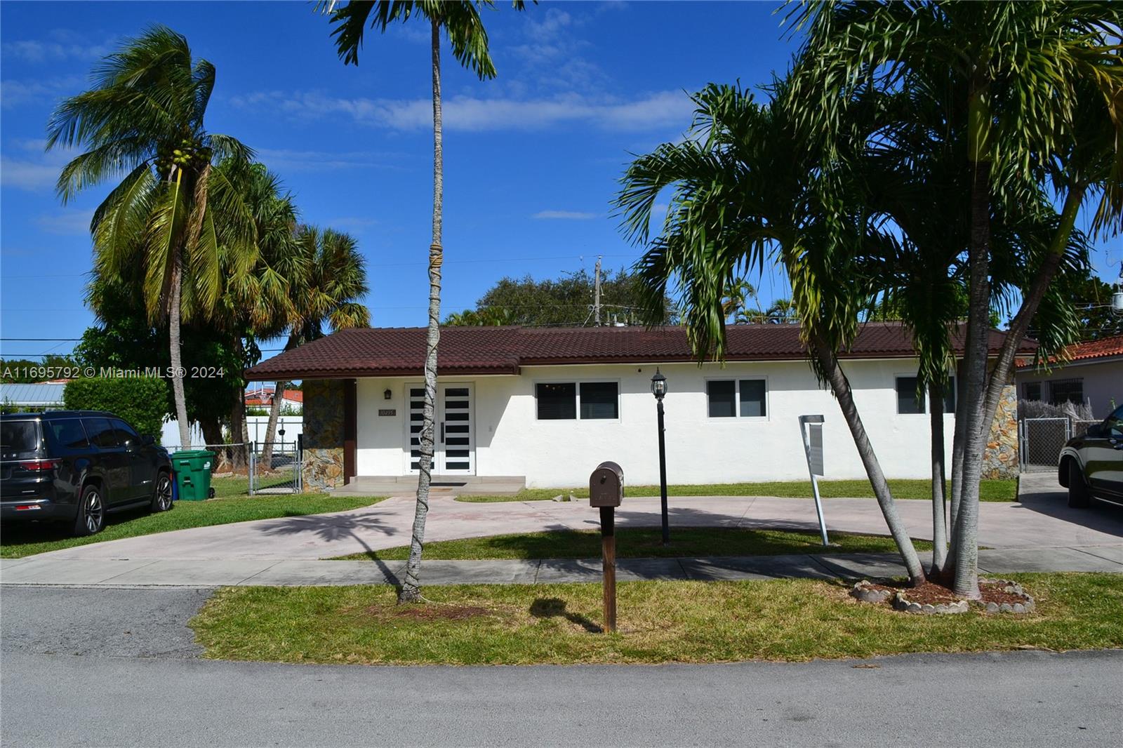 a view of a water fountain in front of a house