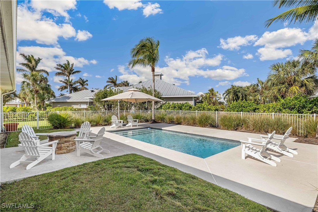 a view of a patio with swimming pool