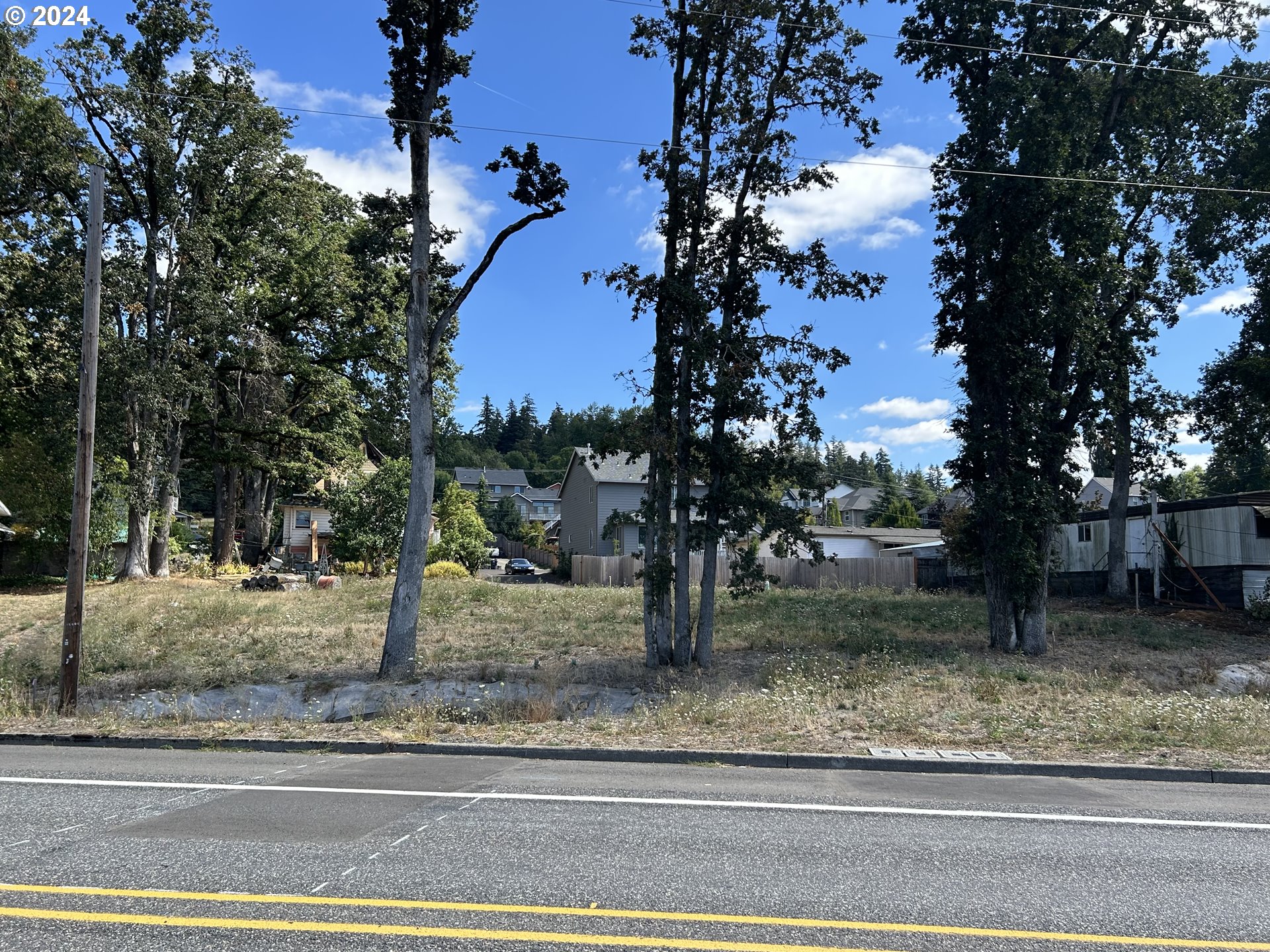 a view of a yard with of tiny house