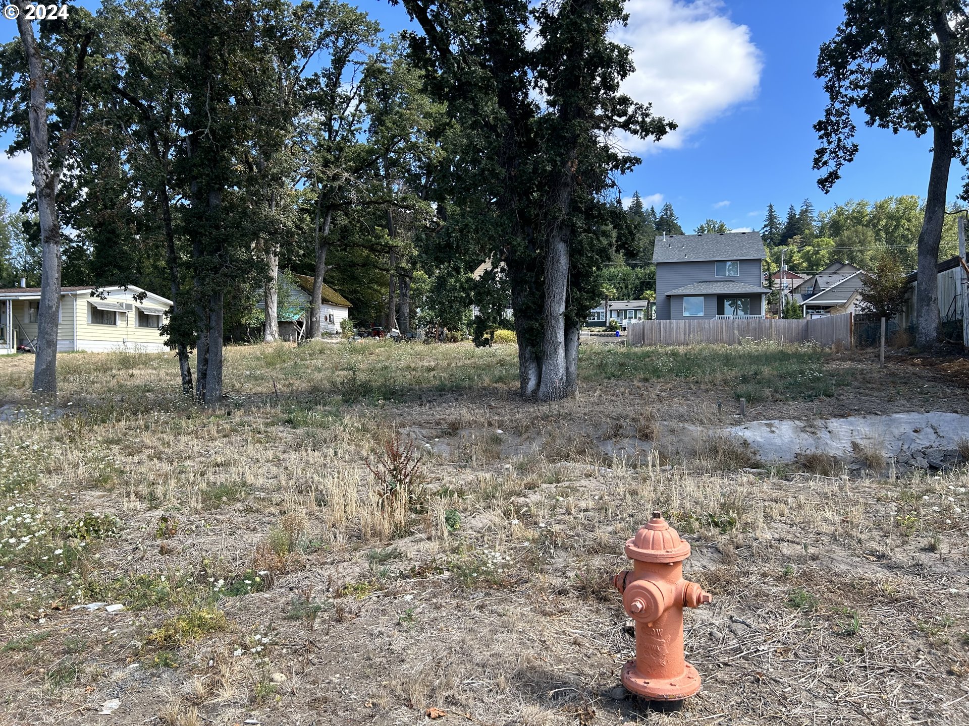 a view of a house with a sink and tree