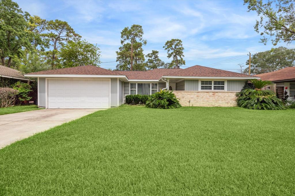 [FRONT ELEVATION] Welcome to this stunning single-story home featuring a well-maintained lawn, an attached two-car garage, and beautiful landscaping. Situated on a large lot in the desirable Oak Forest neighborhood!