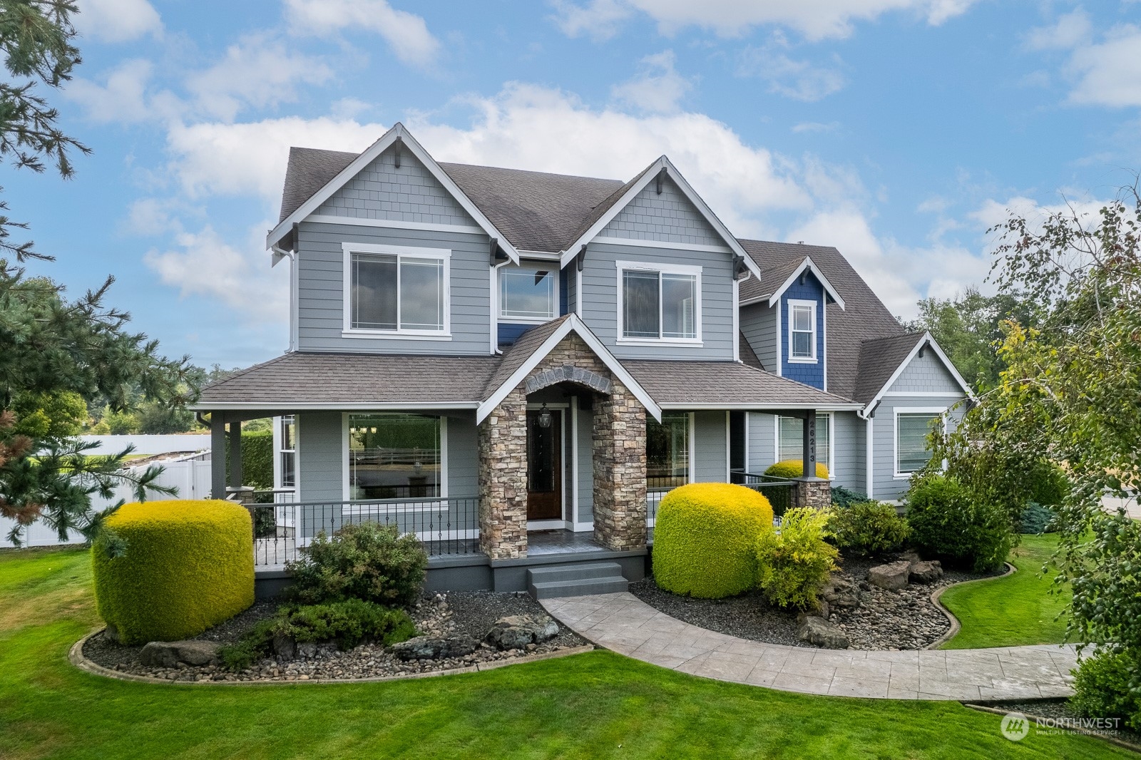 a view of outdoor space yard and front view of a house