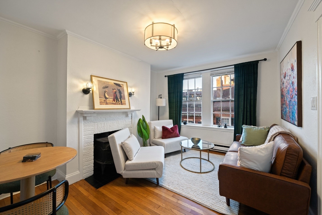 a living room with furniture and a table