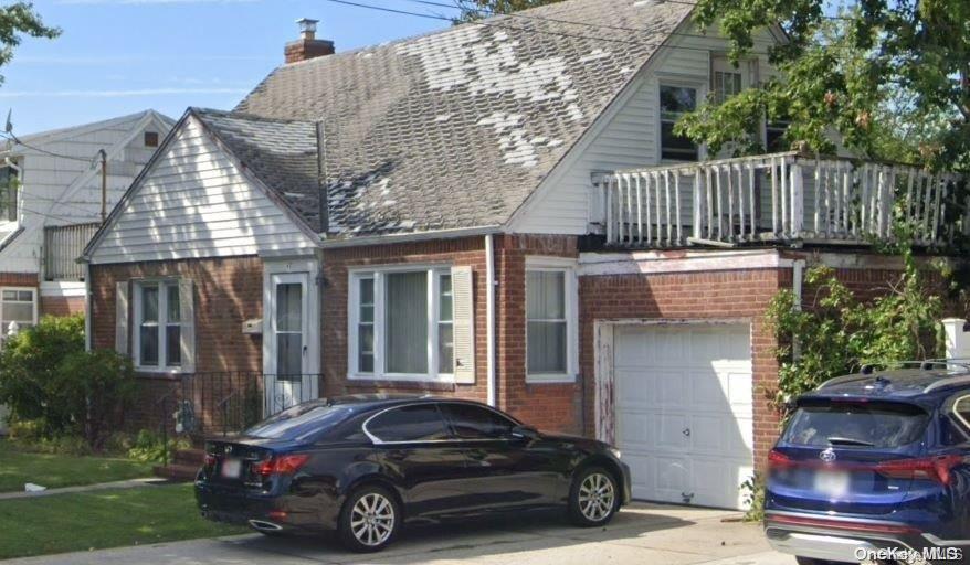 a car parked in front of a house