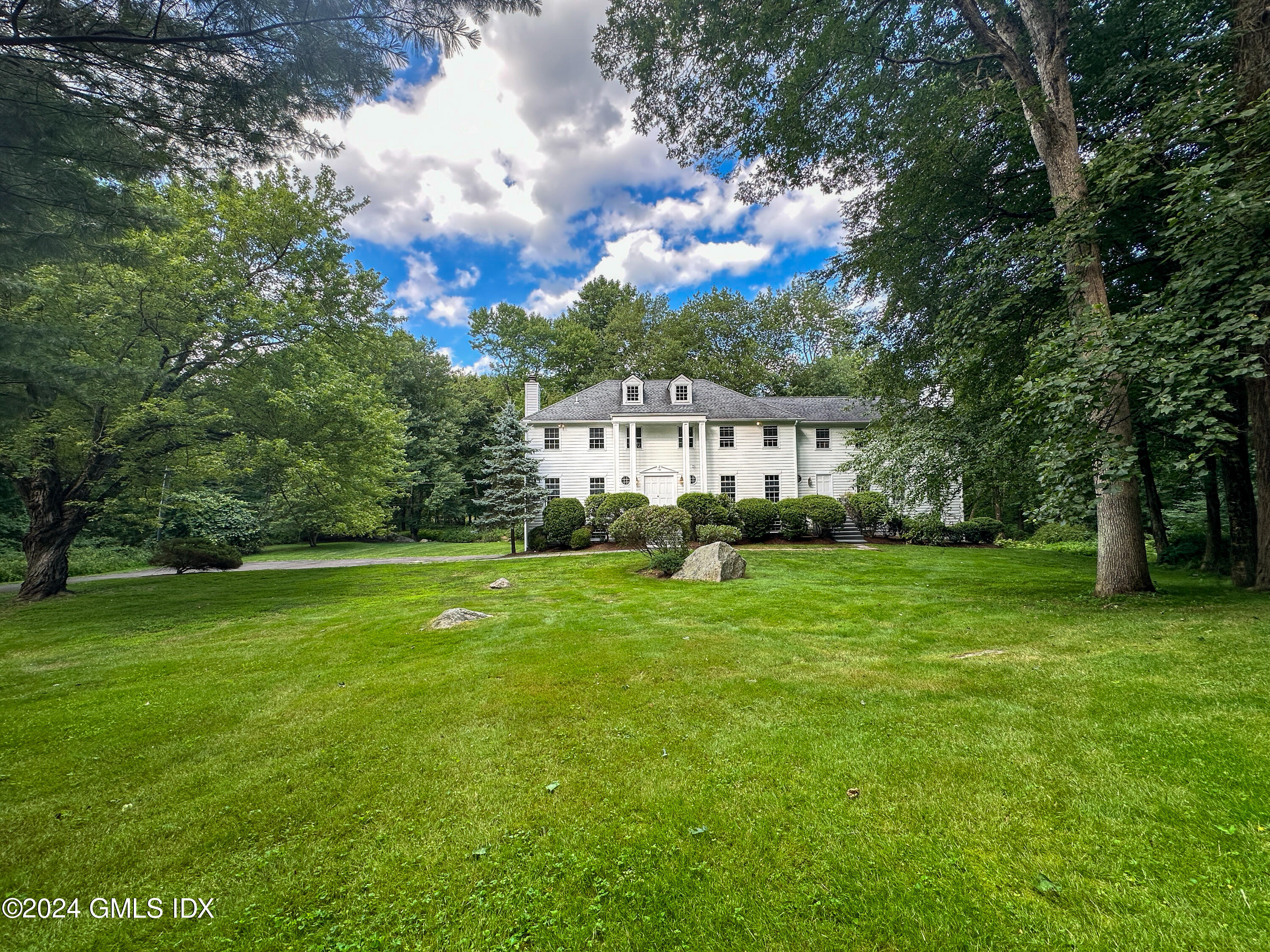 a view of a house with a big yard