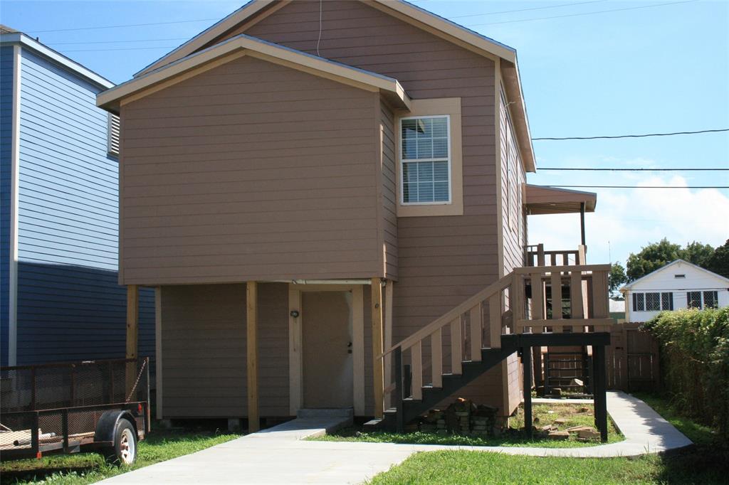 a front view of a house with yard