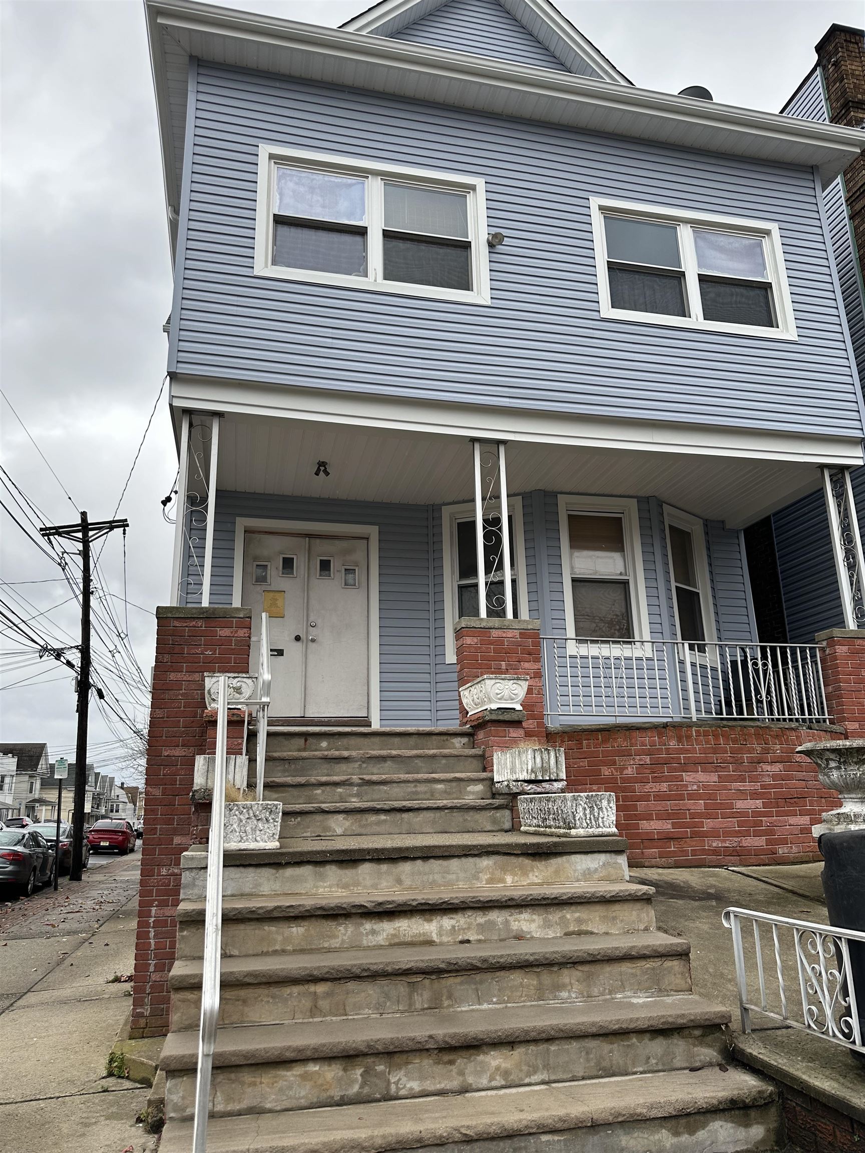 a front view of a house with a balcony