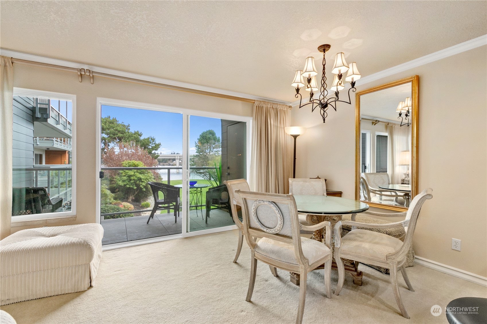 a dining room with furniture and window